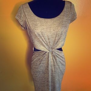 Gold mini dress with cut outs.